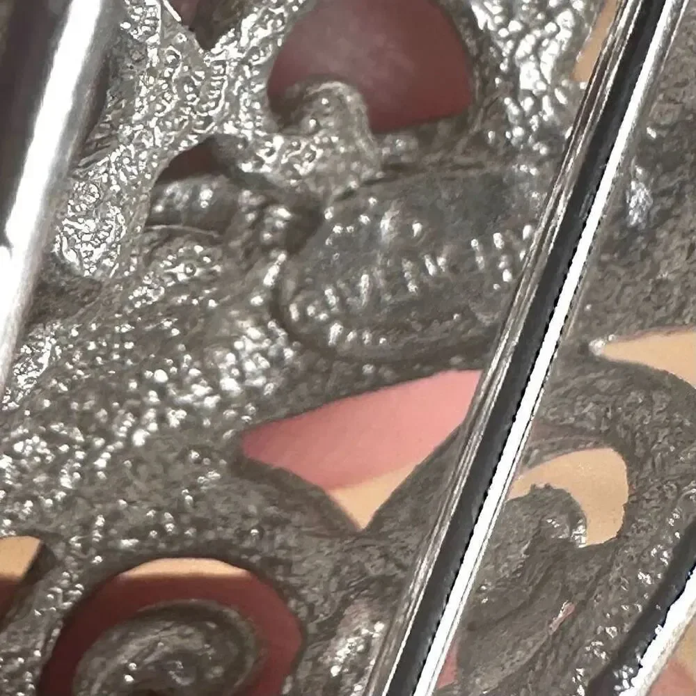 Givenchy silver swirl